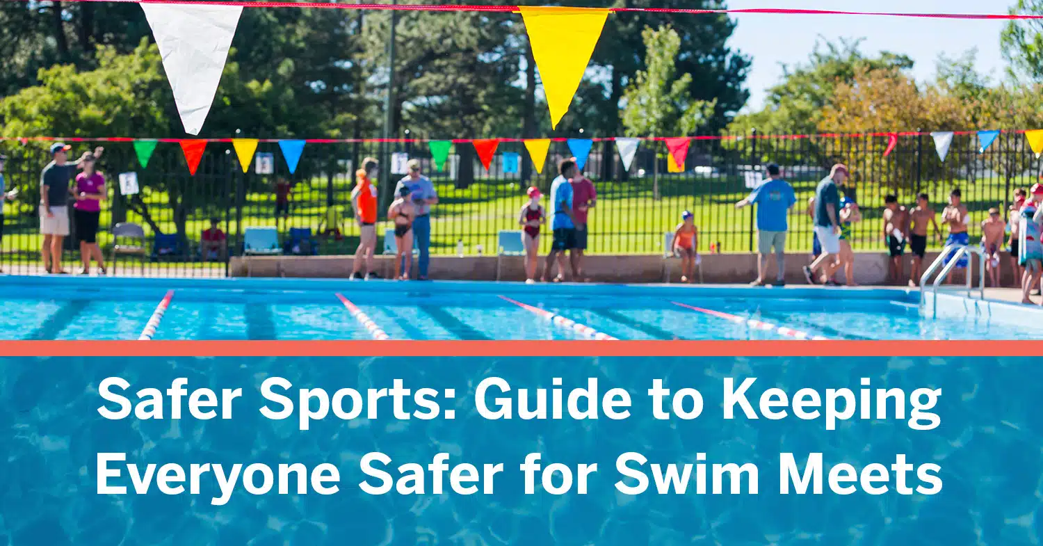 People at an outside pool, enjoying a safer sports swim meet.